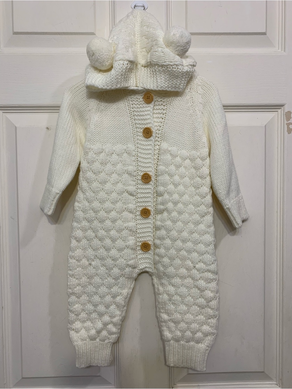 Off White Knit Unisex Baby Romper with Hood and Buttons Closure.           3843